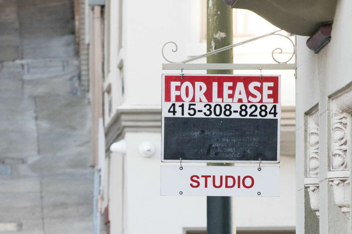 A for lease sign hangs outside an apartment building in San Francisco on Nov. 19, 2020.