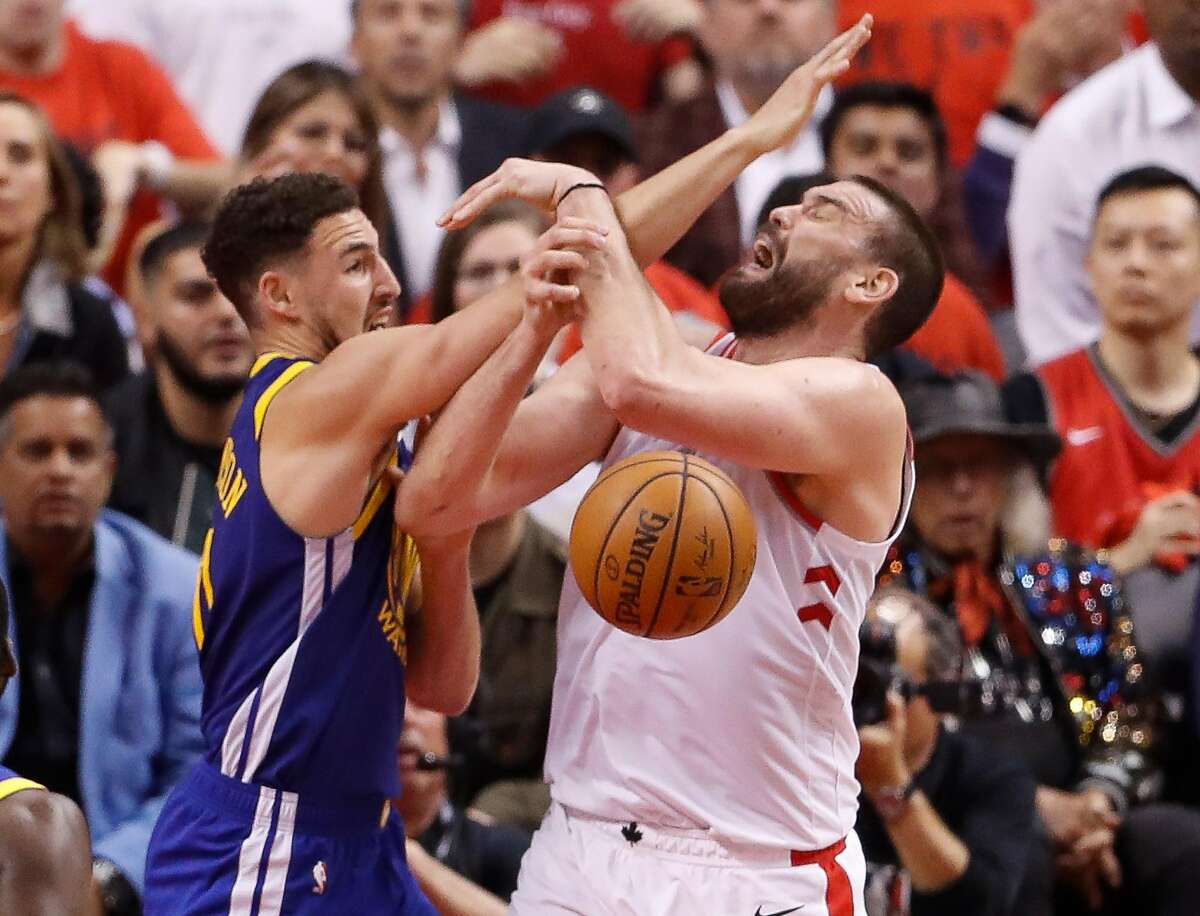 Golden State Warriors’ Klay Thompson defends against Toronto Raptors’ Marc Gasol in the third quarter during game 5 of the NBA Finals between the Golden State Warriors and the Toronto Raptors at Scotiabank Arena on Monday, June 10, 2019 in Toronto, Ontario, Canada.