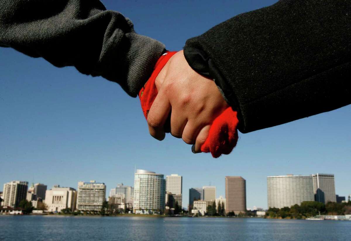 Two people previously holds hands in the United States. The Chair of the Republican Town Committee in Ridgefield writes this guest column after Election Day when votes from the election were being counted.