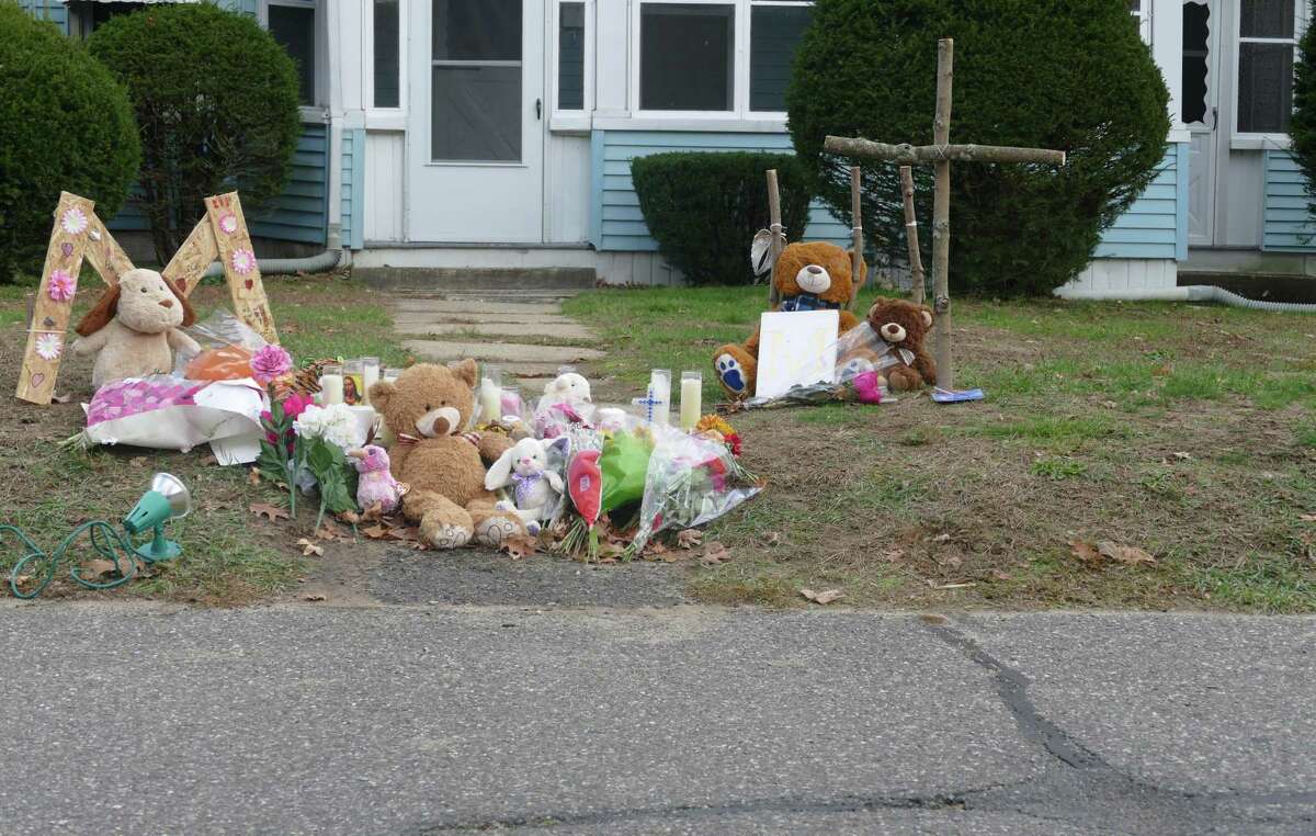 A memorial has been set up outside a Plymouth home where police say two children were shot Friday night. A 15-year-old was killed and a 7-year-old was seriously injured, police said.