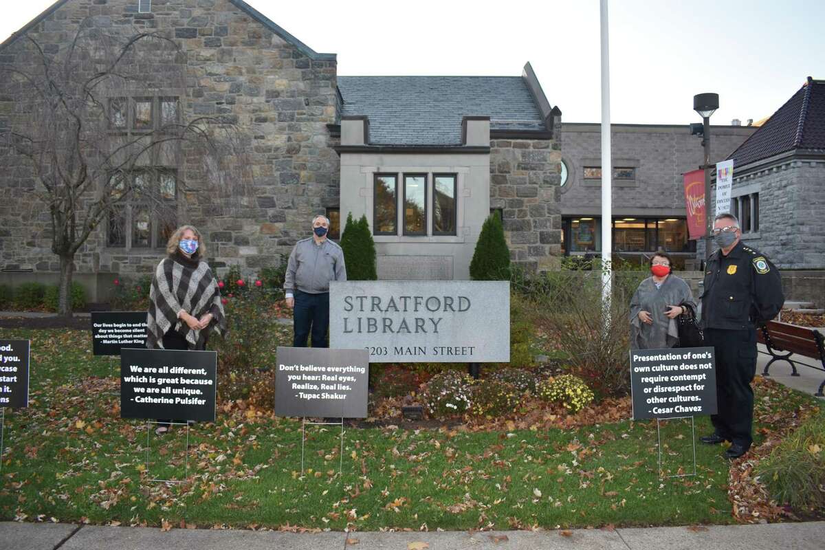 The Stratford Library held a ribbon-cutting Monday, Nov. 16, 2020 for an anti-racism exhibit of lawn signs featuring quotes from people of color.