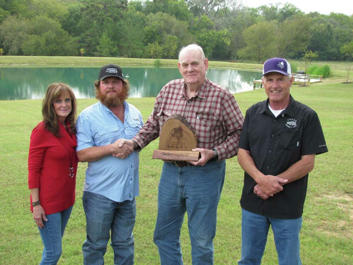 Dave Duren, Texas Logging Council Coordinator; and Bob Harper, consulting forester; present the 2020 Outstanding Logger of the Year award to Deaven Futral and Kelly Underwood during the TFA virtual annual meeting held Oct 28-29 at their headquarters in Lufkin.