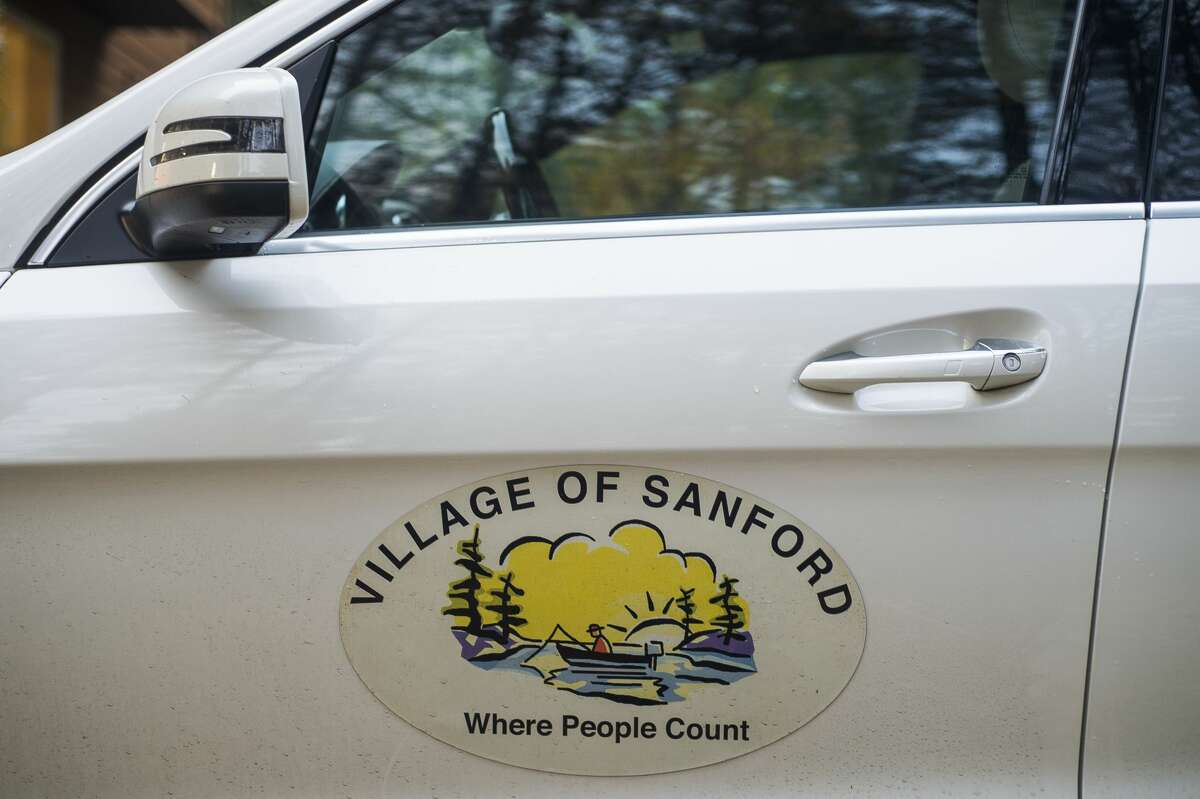 8:16 a.m. - A magnet clings to the vehicle of Sanford Village President Dolores Porte at her home on Monday, Oct. 19, 2020. (Katy Kildee/kkildee@mdn.net)