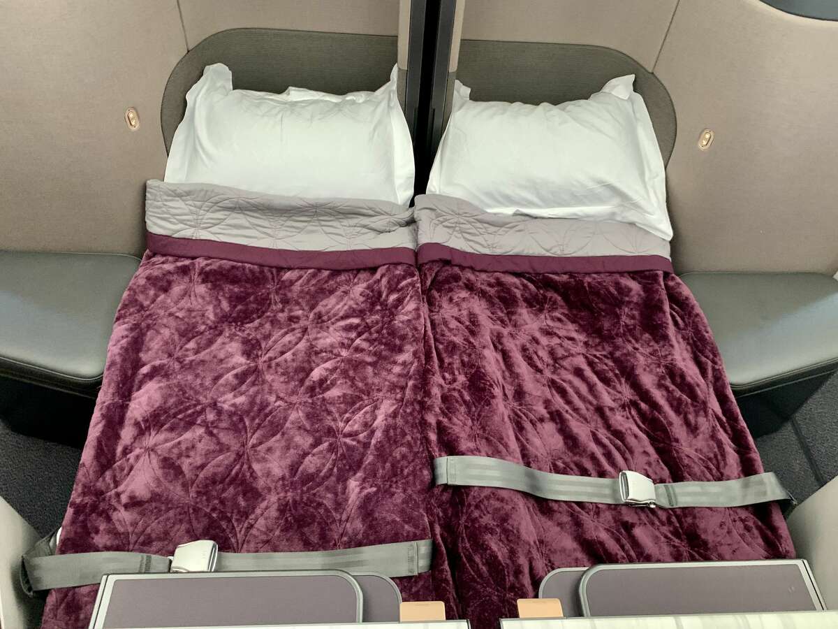 At bedtime, center business class Qsuite seats can be joined to create a fully flat double bed on the Qatar Airways Airbus A350 that will fly between San Francisco and Doha.