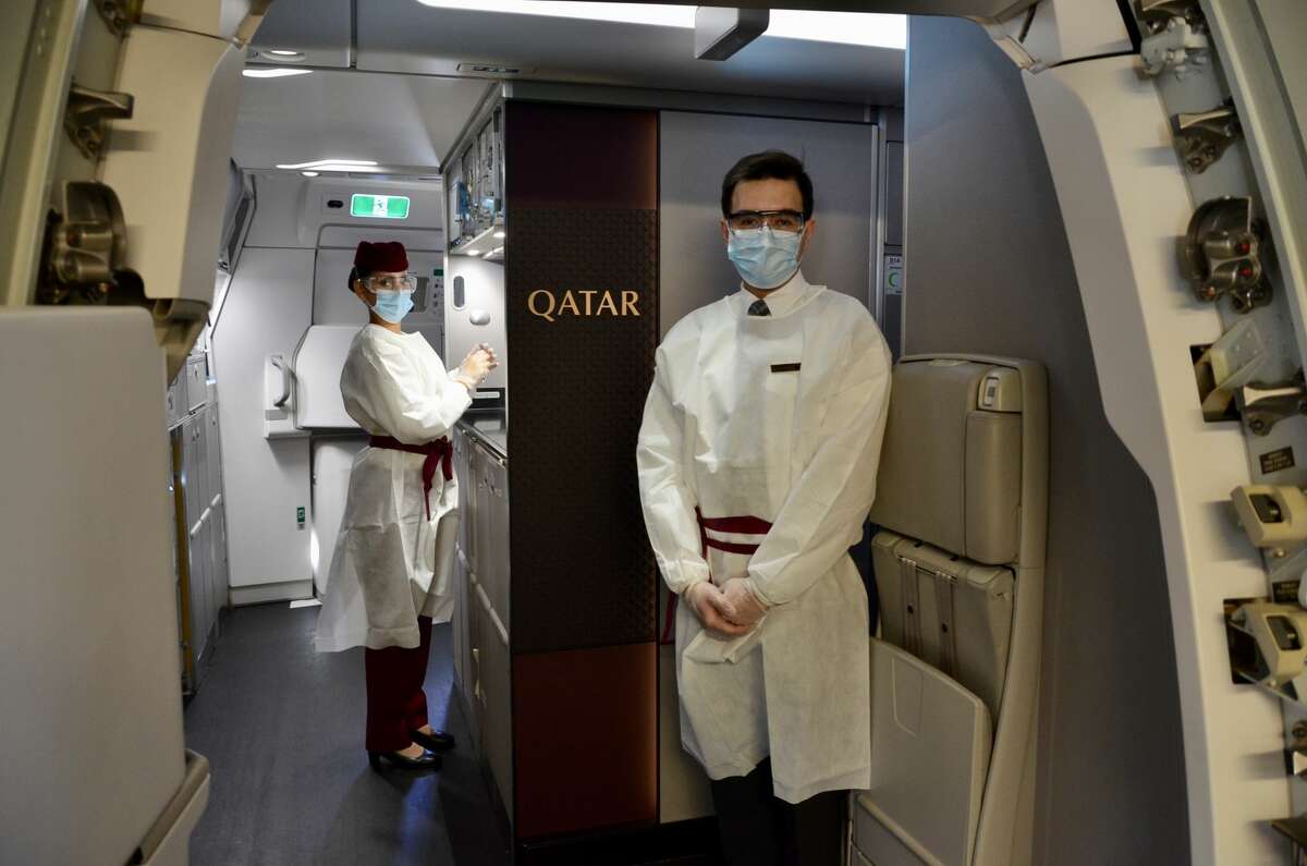 A very antiseptic but friendly welcome on board by cabin crew wearing special gowns, masks, gloves and goggles. SEE THE SLIDESHOW at the top of this post for an in-depth look!