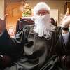 Santa (District Court Judge Randy Shelton) plays for the children during adoption proceedings conducted virtually. Santa made a special trip to the Jefferson County Courthouse Friday morning to join 10 children with their forever families just in time for the holidays. This is the 20th year the county has participated in National Adoption Day. This year looked a little different with many adoptions being held in a virtual setting using Zoom meeting technology due to COVID-19 precautions. Jefferson County finalized adoptions for 10 children into 6 new Forever Families virtually in District Judge Sheltonâs court chambers. Photo made on November 20, 2020. Fran Ruchalski/The Enterprise
