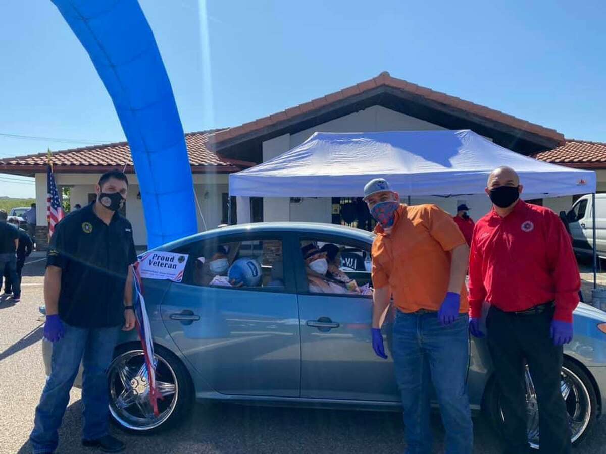 Webb County Precinct 1 Commissioner Jesse Gonzalez with assistance from Councilman Vidal Rodriguez and Precinct 2 Place 1 Justice of the Peace Bobby Quintana provided thanksgiving meals to veterans during the Fifth Annual Giving Thanks To Those Who Served Drive-Thru Giveaway.