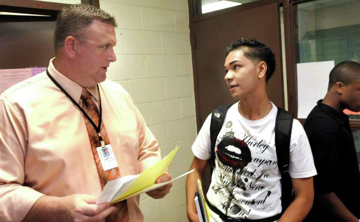 Dan Donovan, principal of the Freshman Academy, talks with Enea Alevica, at Danbury High School on the first day of classes, Thursday, Sept. 2, 2010.