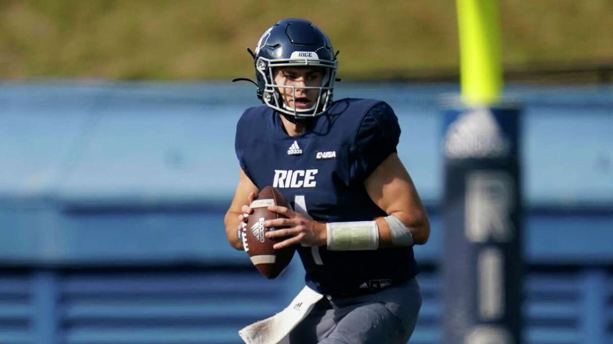 Rice quarterback Mike Collins looks to pass against Middle Tennessee in October.
