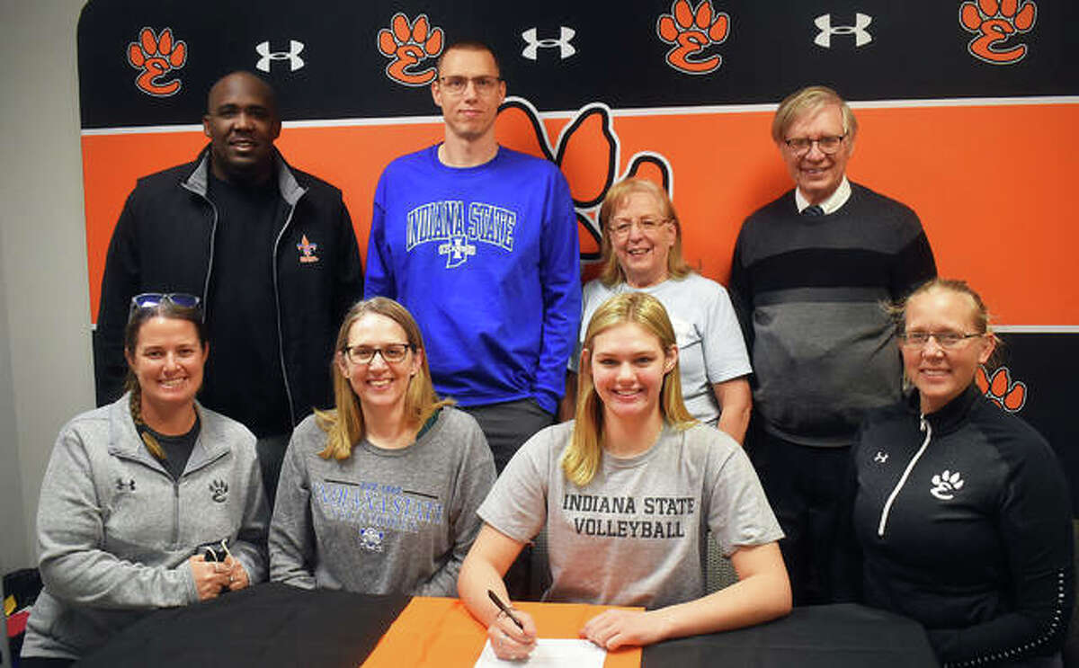 Edwardsville High School senior Storm Suhre, seated second from right, will play college volleyball at Indiana State. She is joined by her family, including her grandparents, club coach, EHS coach Heather Ohlau and EHS assistant coach Camilla Eberlin.