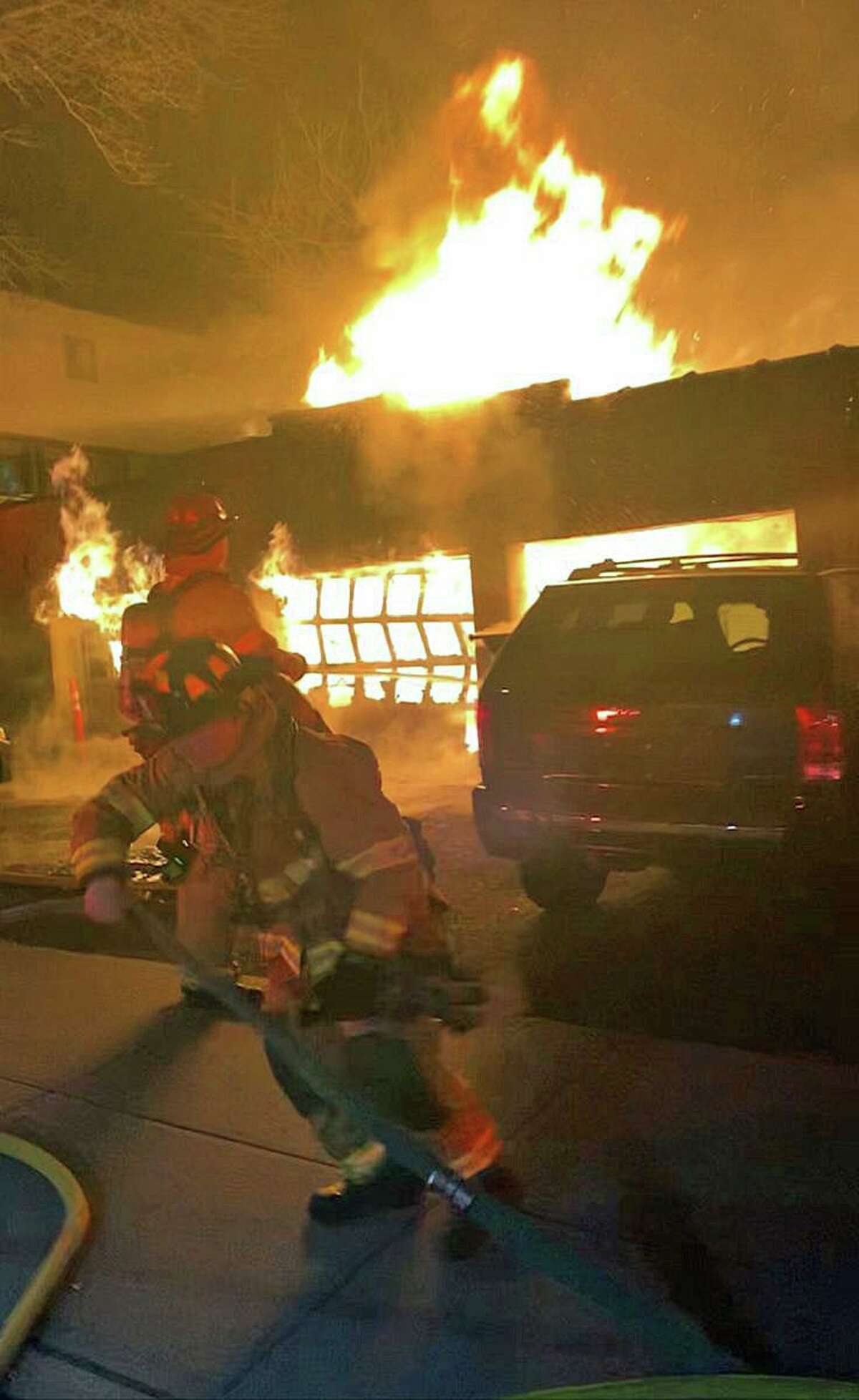 A garage fire on Diaz Street in Stamford, Conn., on Sunday, Nov. 22, 2020.