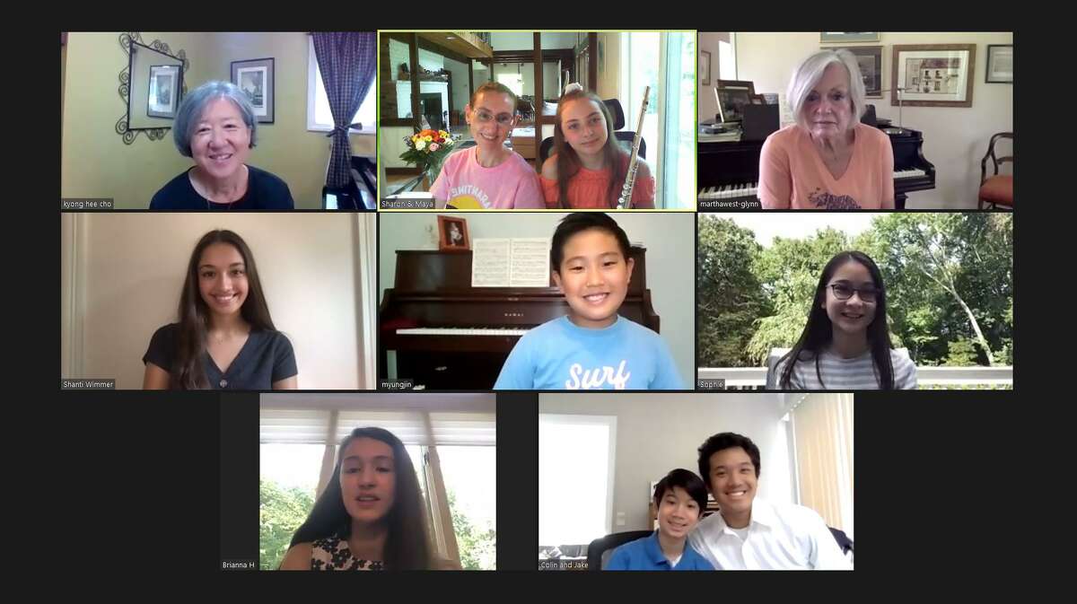 Wilton piano teacher Kyong Hee Cho, upper left, meets virtually with her students who will perform in a benefit concert on Nov. 29.