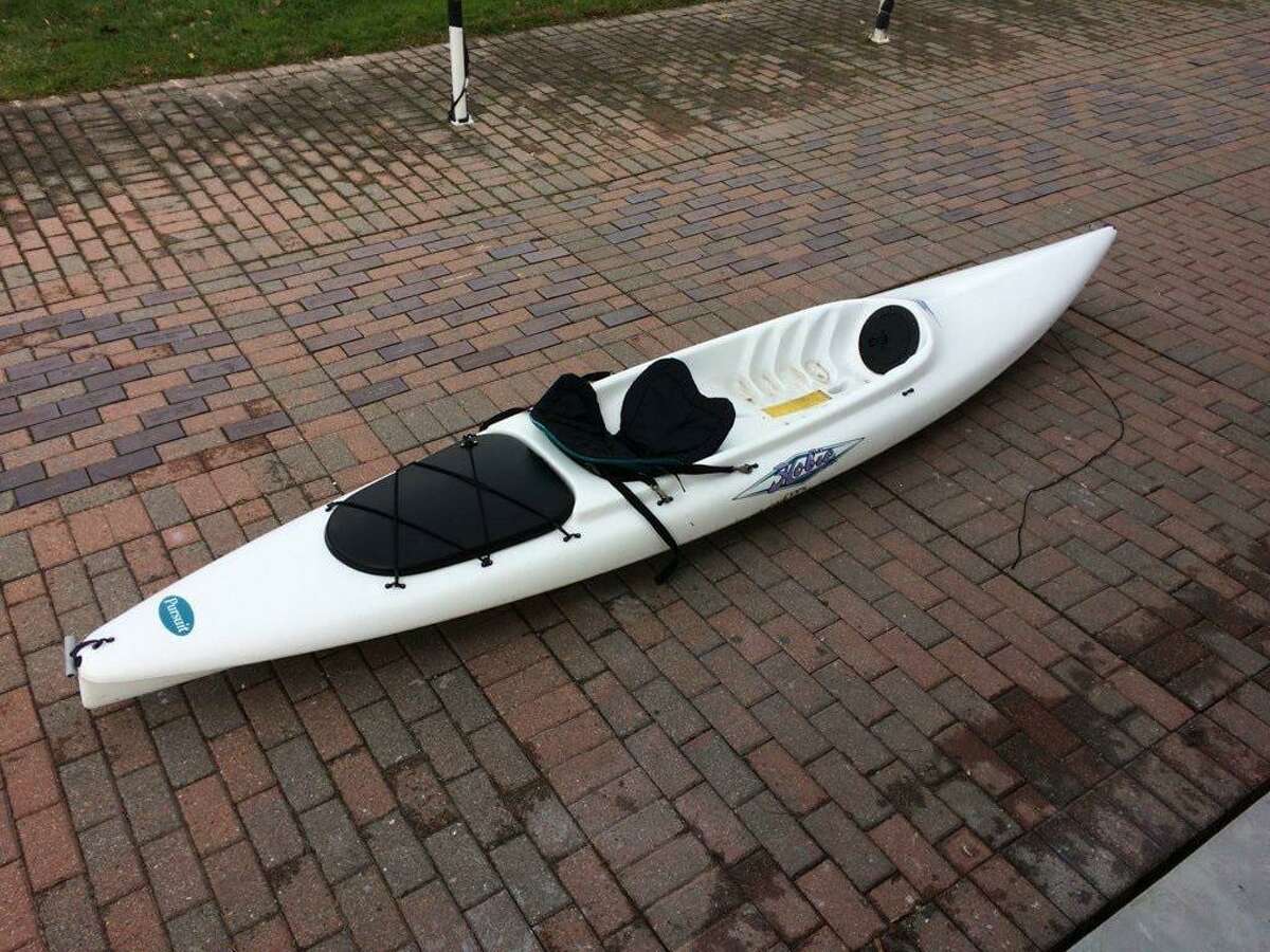 A white kayak was found on the beach in Stamford, Conn., on Nov. 23, 2020.