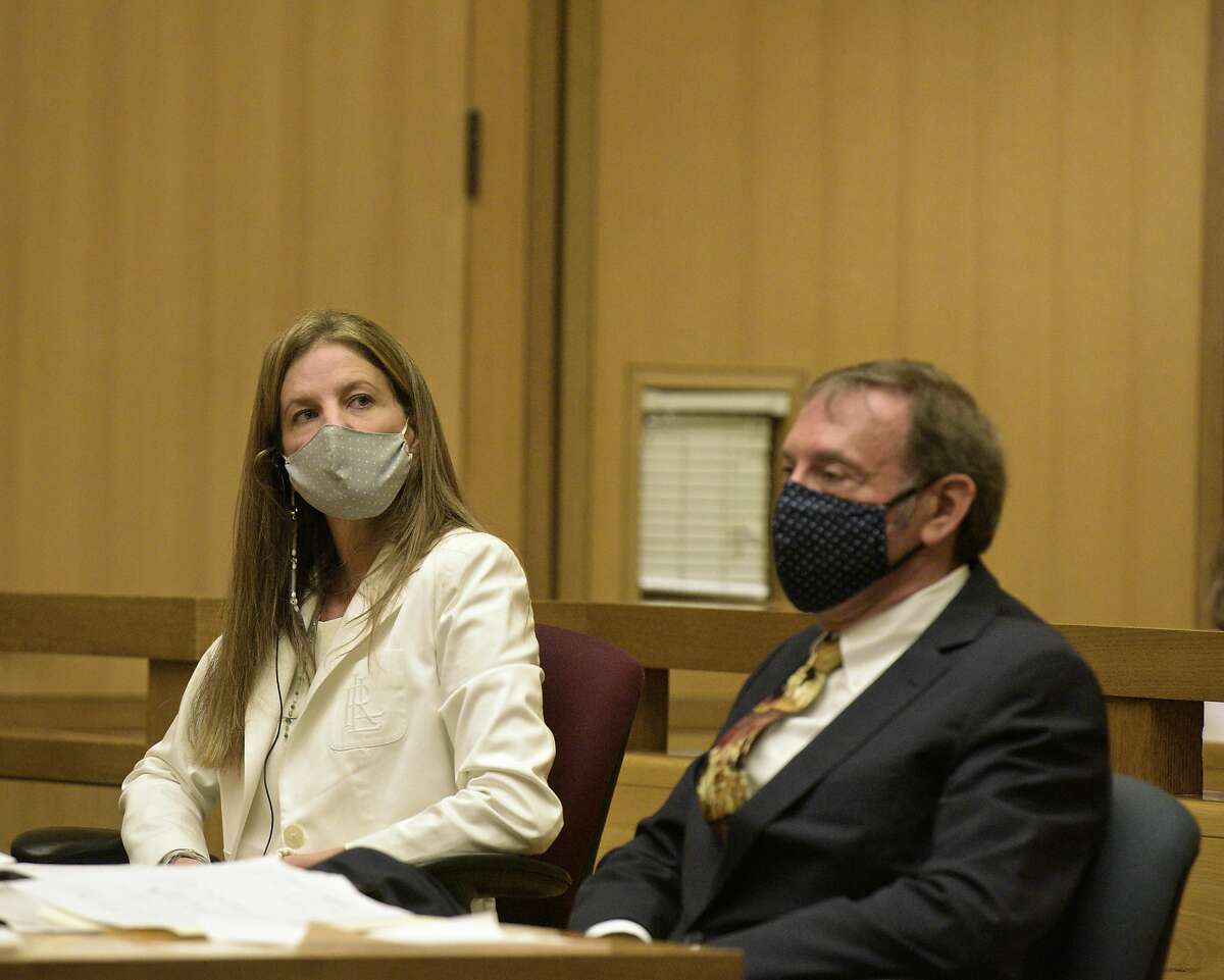 Michelle Troconis appeared in Stamford Superior Court on August 28, 2020 in connection to charges in the disappearance of Jennifer Dulos. Attorney Jon Schoenhorn sat beside her.