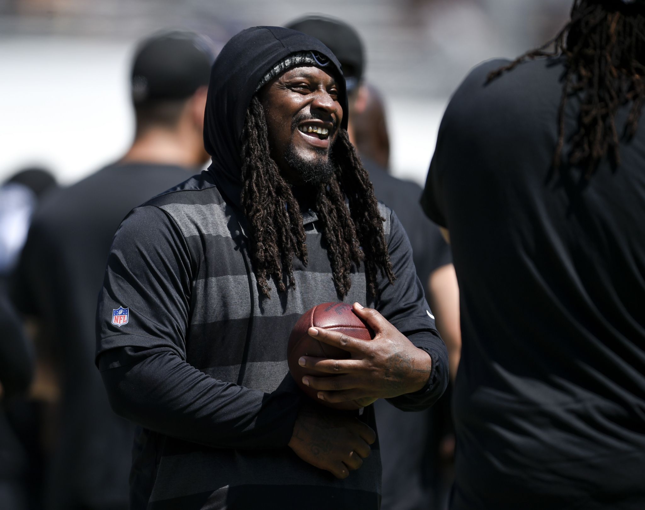 Marshawn Lynch is spotted in Hawaii handing out free turkeys