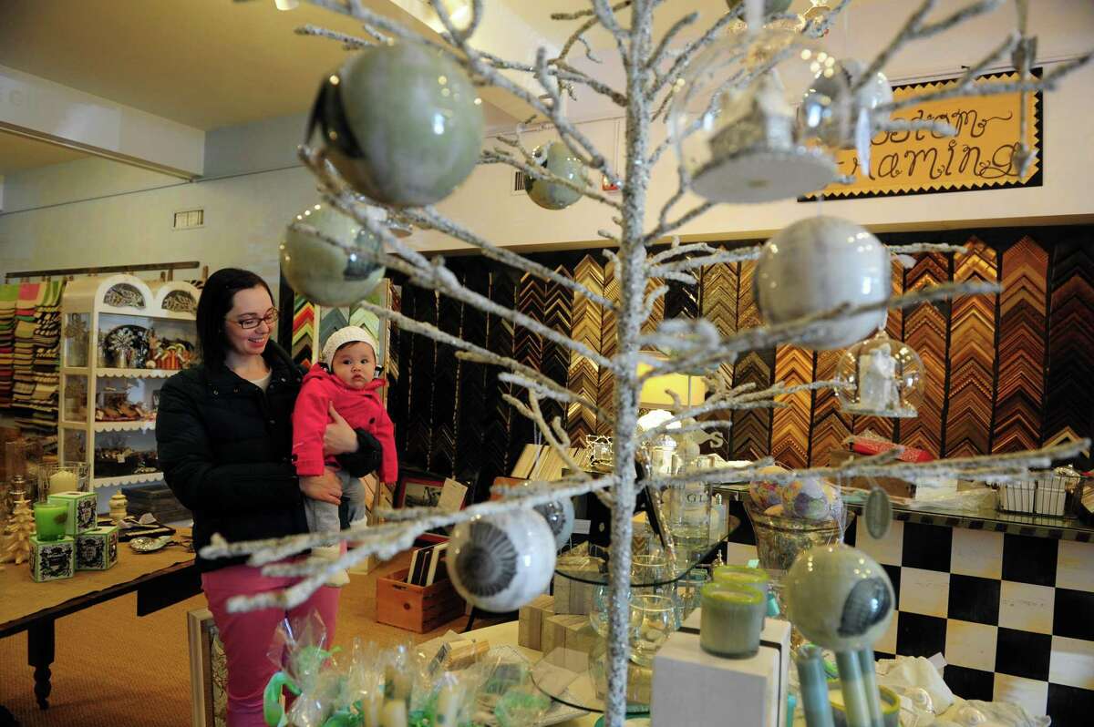 A resident shops locally at Palooza in Fairfield during Small Business Saturday Nov. 24, 2012 .