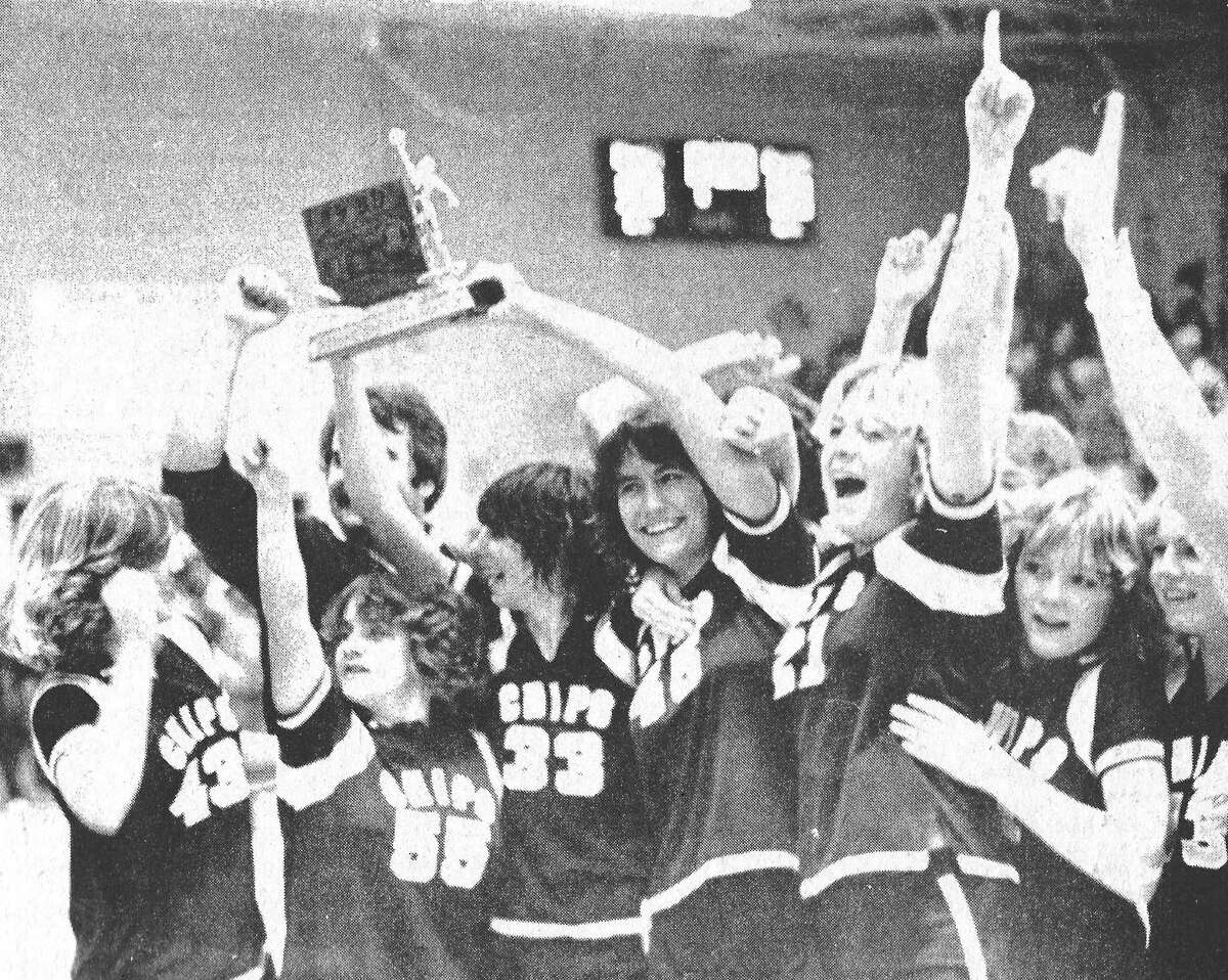From the New Advocate's sports section 40 years ago, "A joyous group of Manistee High School girls' basketball players and their coach, Mike Munro, celebrate winning the Class B district 61 championship last night at Big Rapids. Manistee defeated Big Rapids, 60-53, and now moves on to regional action in Gaylord." (Manistee County Historical Museum photo)