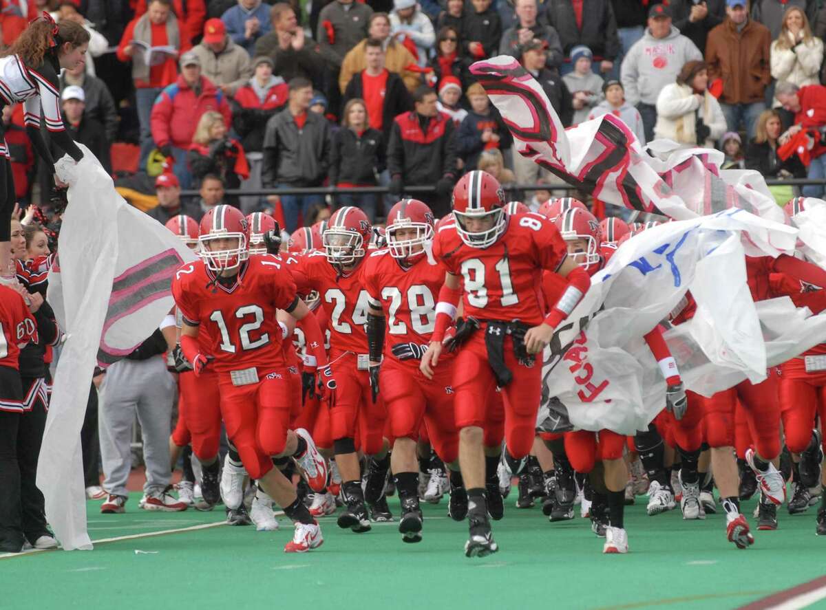 The Rams enter the field for the 2008 Turkey Bowl and FCIAC football final between New Canaan and Darien at Stamford's Boyle Stadium.