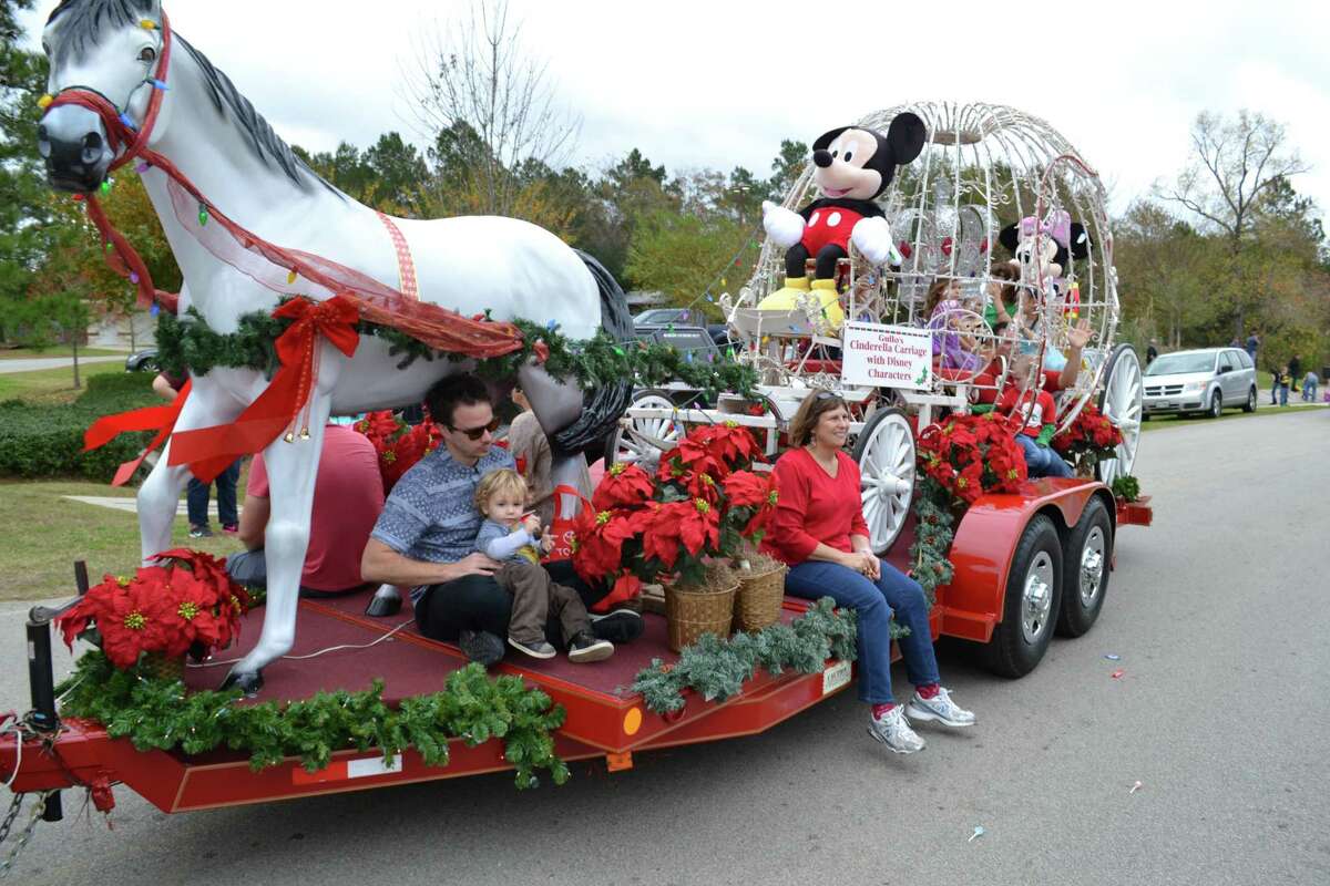 A Disney themed float makes its way past spectators during a previous Christmas parade in Magnolia. The Greater Magnolia Parkway Chamber is scheduled to host its 40th Annual Magic of Christmas Parade of Lights on Dec. 5.