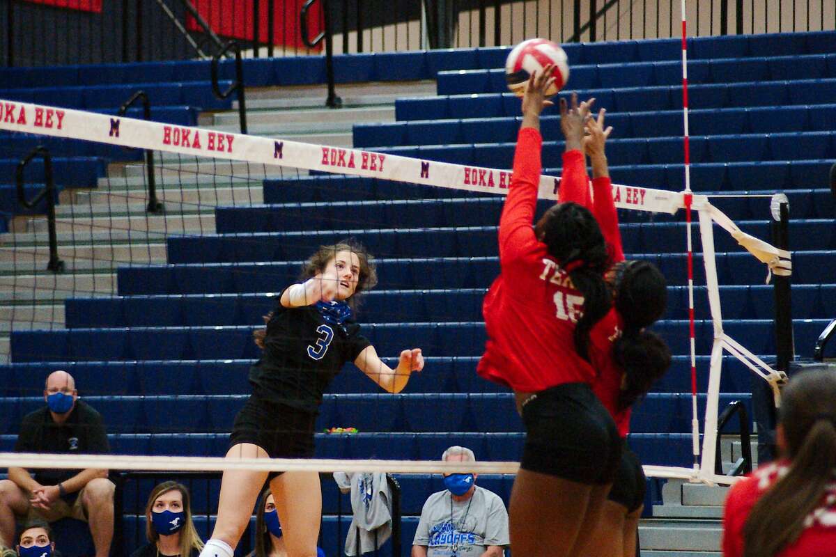 Friendswood's Kate Bueche (3) tries to hit a shot past Terry's Gloria Asabi (15) and Terry's Cayla Anthony (2) Tuesday, Nov. 24 at Manvel High School.