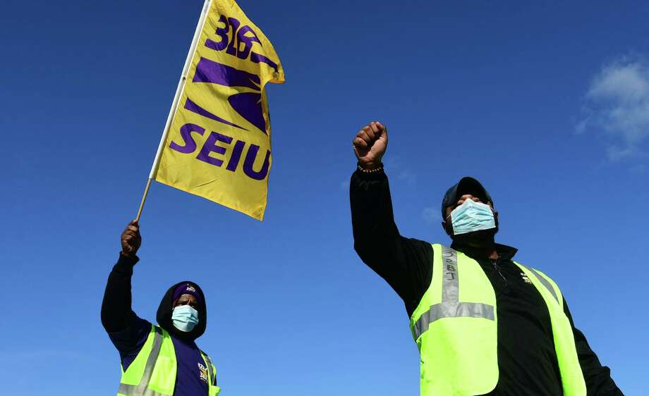 Members of SEIU local 32BJ join McDonald’s franchise workers as they strike Tuesday, November 24, 2020, during an Rally &amp; Caravan over safety concerns during the COVID spike and Thanksgiving travel season at the I-95 CT Northbound Service Plaza in Norwalk, Conn. Workers have been organizing with 32BJ SEIU to win union recognition, better treatment, pay and benefits. Photo: Erik Trautmann / Hearst Connecticut Media / Norwalk Hour