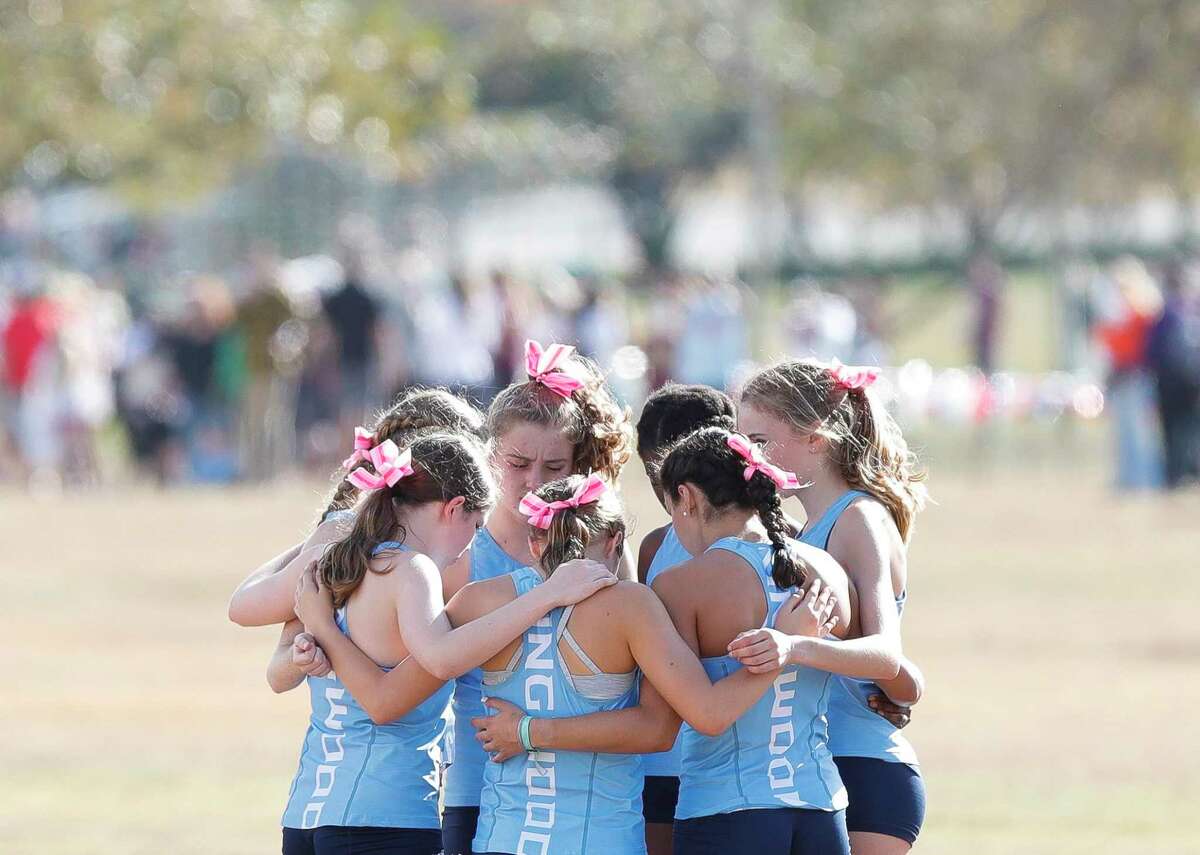 Kingwood runners gather before the Class 6A race during the UIL State Cross Country Championships at Old Settlers Park, Tuesday, Nov. 24, 2020, in Round Rock.