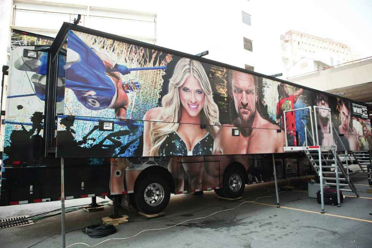 The control center for WWE TV broadcasts is contained in a truck decorated with images of the stars. (WWE)