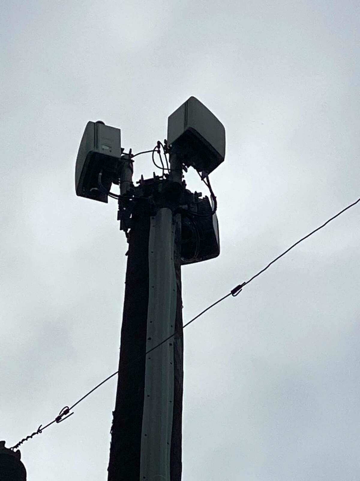 Verizon’s 5G transmitters are small and placed atop utility poles.