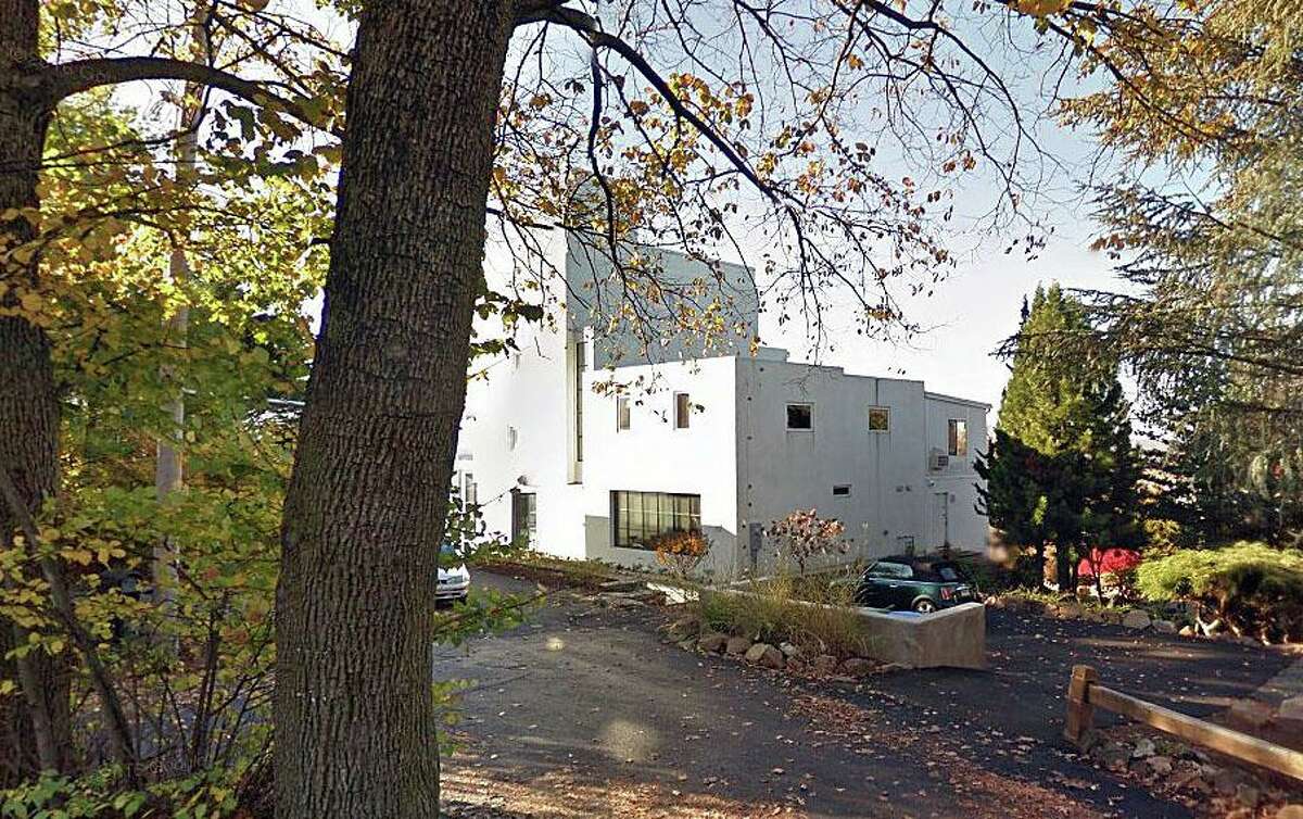 The house at 150 Deepwood Drive in Hamden, Conn., is on the market for almost $2 million.