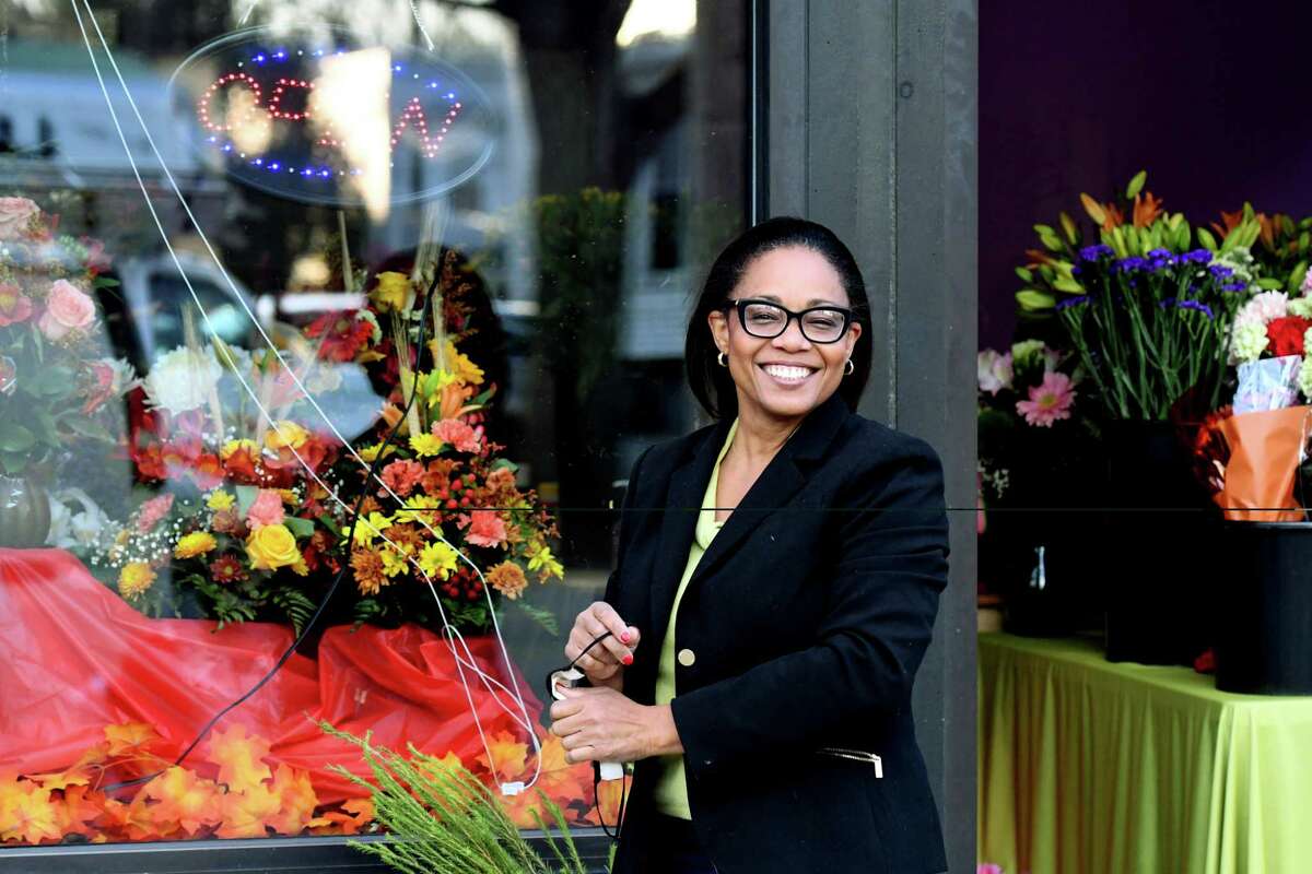 Marie Campbell is pictured outside of her flower shop, Blooms By Marie, on Friday, Nov. 20, 2020, on Madison Avenue in Albany, N.Y. Marie's small business has seen unexpected success this year. (Will Waldron/Times Union)