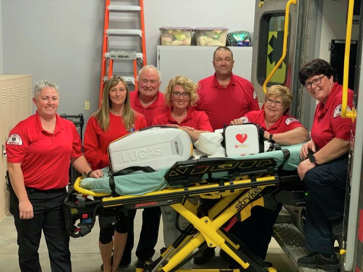 Pictured from left to right are Denise Maguire, driver; Tara Winter, EMT; Lonnie Vermeersch, MFR; Rebecca Fritz, EMT; Kenneth Currey, EMT; Kathy Hare, EMT; and Alice Vermeersch, EMT. The new equipment includes bariatric side rails and mattress, new Lucas chest compression machine, new defibrillator, and updated auto-load cot. (Courtesy Photo)