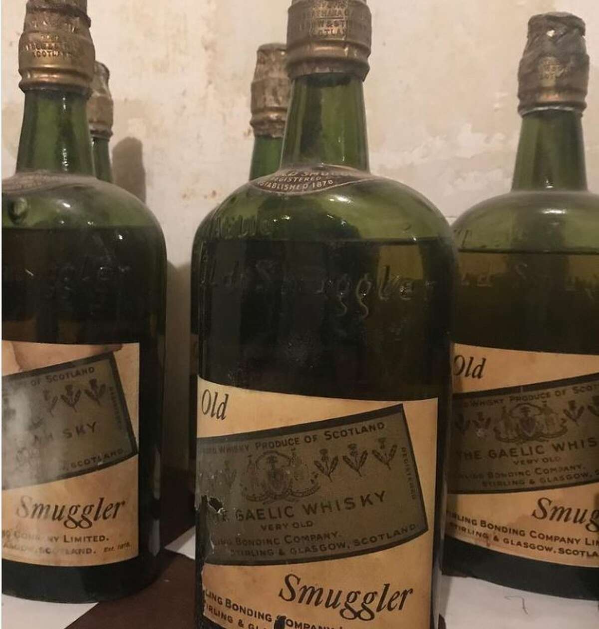 Nick Drummond and Patrick Bakker bought a fixer-upper in Ames, N.Y. and found 88 bottles of Prohibition-era whisky in the walls and under the floorboards.
