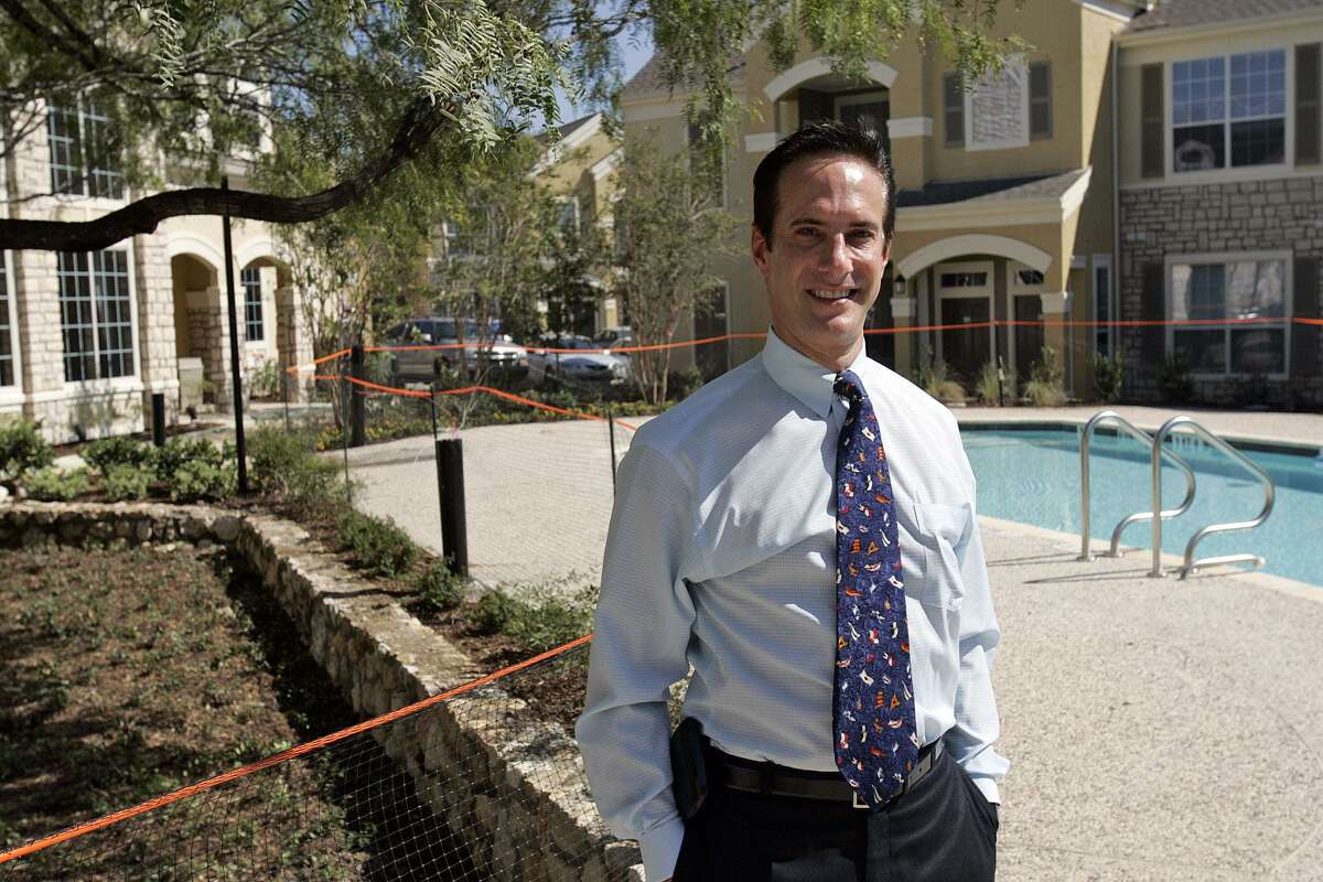 Developer Dan Markson poses Wednesday, October 19, 2005 in the pool area of Costa Biscaya, a 250 apartment community at 5100 Eisenhauer Road that will opening this weekend. (TOBY JORRIN/SPECIAL TO EXPRESS-NEWS)