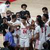 Houston Cougars guard Quentin Grimes (24) is congratulated by teammates after a making 3-point shot during the first half of an NCAA basketball game Friday, Nov. 27, 2020, at the Fertitta Center in Houston.