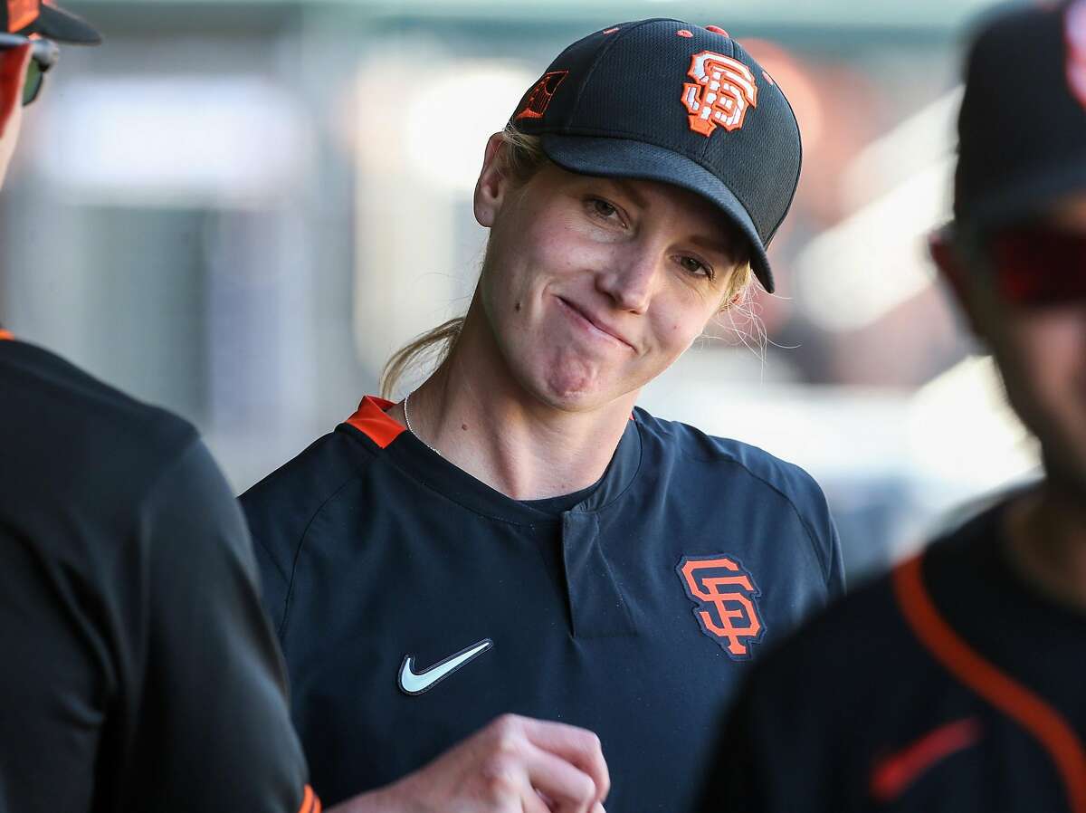 San Francisco Giants' coach Alyssa Nakken in the dugout before their game with the Cleveland Indians at Scottsdale Stadium Thursday, March 5, 2020, in Scottsdale, Arizona.