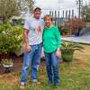 Gary and Susan Miguez stand in the backyard of their home with the towers of the TPC Plant seen over their left shoulders. The plant is about a quarter of a mile from their home and the explosion caused a great deal of structural damage to their home. Port Neches residents are still living with the results of the TPC Group plant explosion one year later. Friday, Nov. 27, marked one year since Port Neches and other surrounding towns in Southeast Texas awoke with a thunderous boom and an orange, glowing sky above their neighborhoods as a chemical plant erupted in flames that burned for the next month. Photo made on November 27, 2020. Fran Ruchalski/The Enterprise