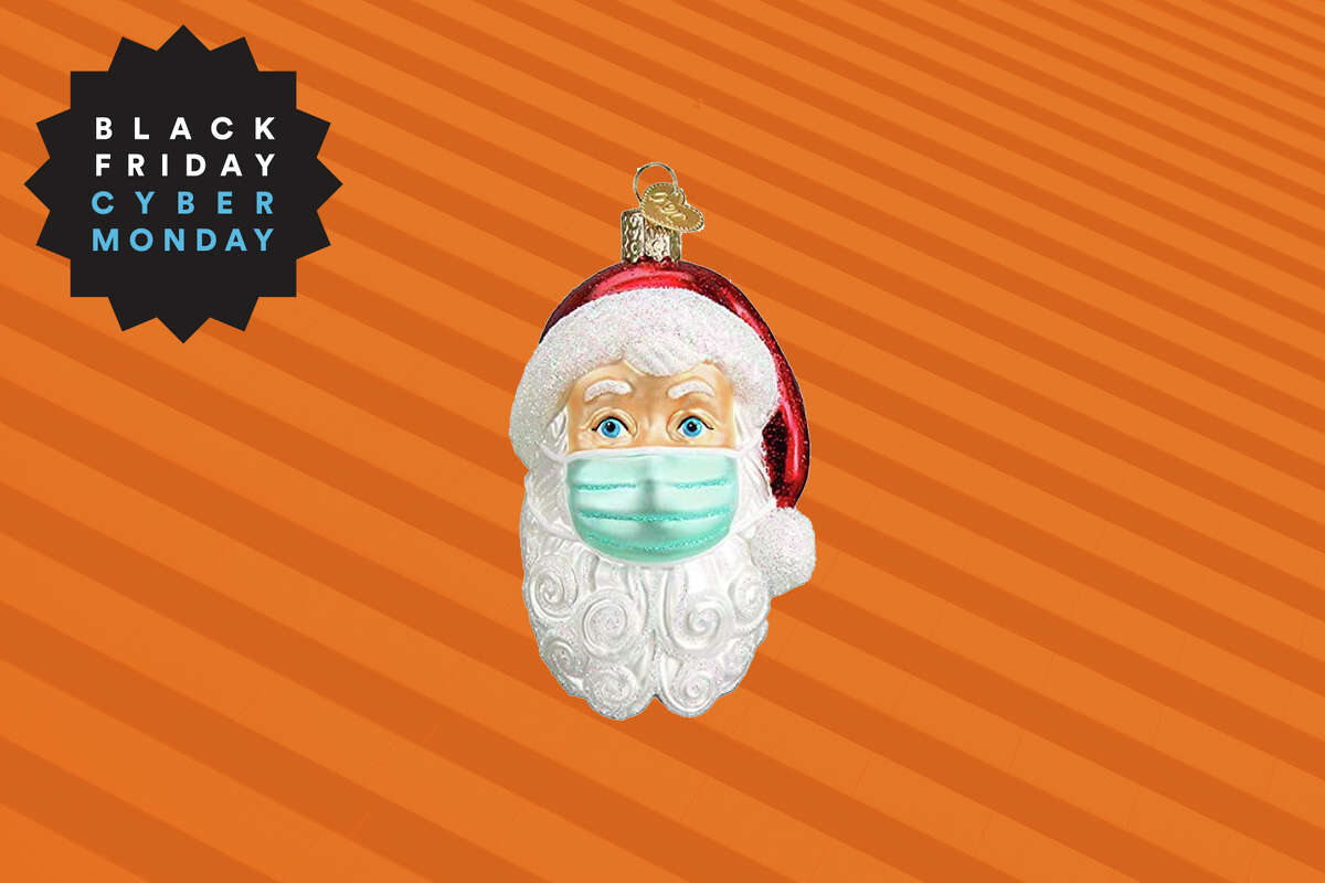 Old World Christmas Santa with Face Mask glass ornament for $6.90 on Amazon