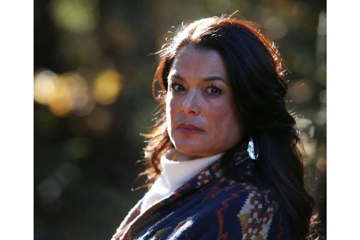 Charlene Nijmeh, chair of the Muwekma Ohlone tribe in the Bay Area, stands for a portrait next to Strawberry Creek on the UC Berkeley campus on Friday, November 27, 2020 in Berkeley, Calif.