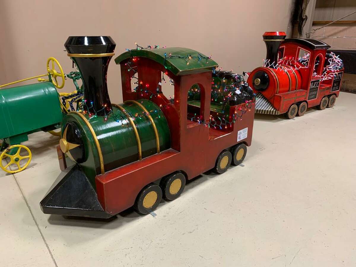 St. John Paul the Great Academy in Torrington held its tours and drive-through Christmas event at Action Wildlife in Goshen this weekend. The event continues Dec. 4-6. Above, a holiday train dispaly in the display building.