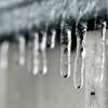 Icicles hang off a ledge as freezing rain hits Beaumont on Tuesday. Photo taken Tuesday 1/16/18 Ryan Pelham/The Enterprise