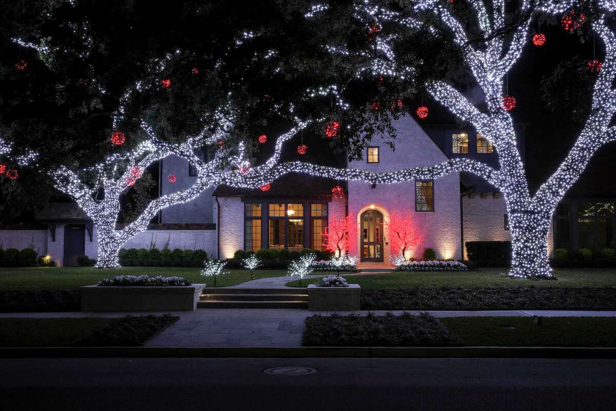 A River Oaks area home decorated with holiday lights Wednesday, Nov. 25, 2020, in Houston.