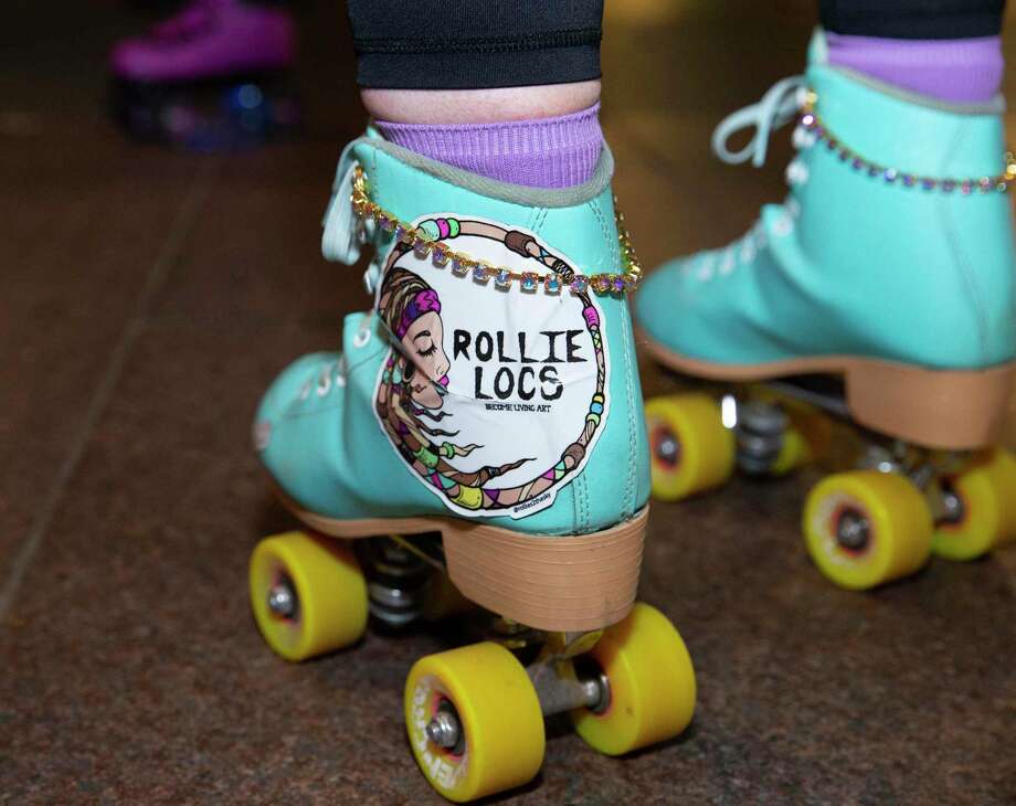 The Space City Roller, a Houston-based girl group of roller skaters, have fun with a Friday night skate Friday, Nov. 20, 2020, at Discovery Green in downtown Houston. Photo: Yi-Chin Lee, Houston Chronicle / Staff Photographer / © 2020 Houston Chronicle