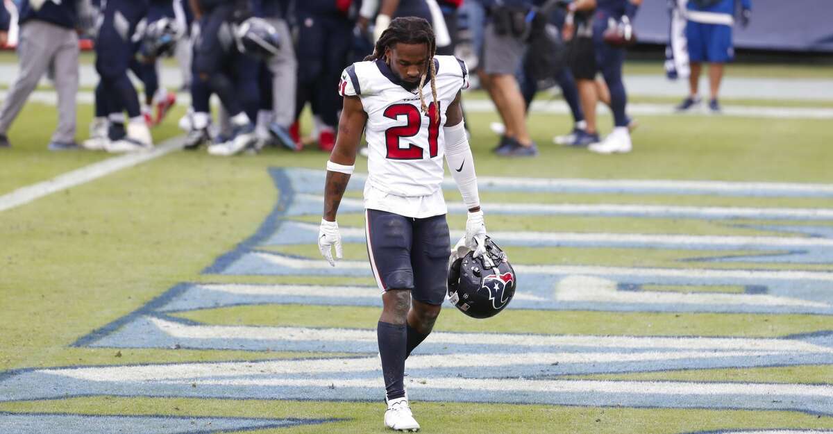 Houston Texans cornerback Bradley Roby (21) walks off the field as the Tennessee Titans celebrates running back Derrick Henry's game winning 5-yard touchdown run during overtime of an NFL football game at Nissan Stadium on Sunday, Oct. 18, 2020, in Nashville.
