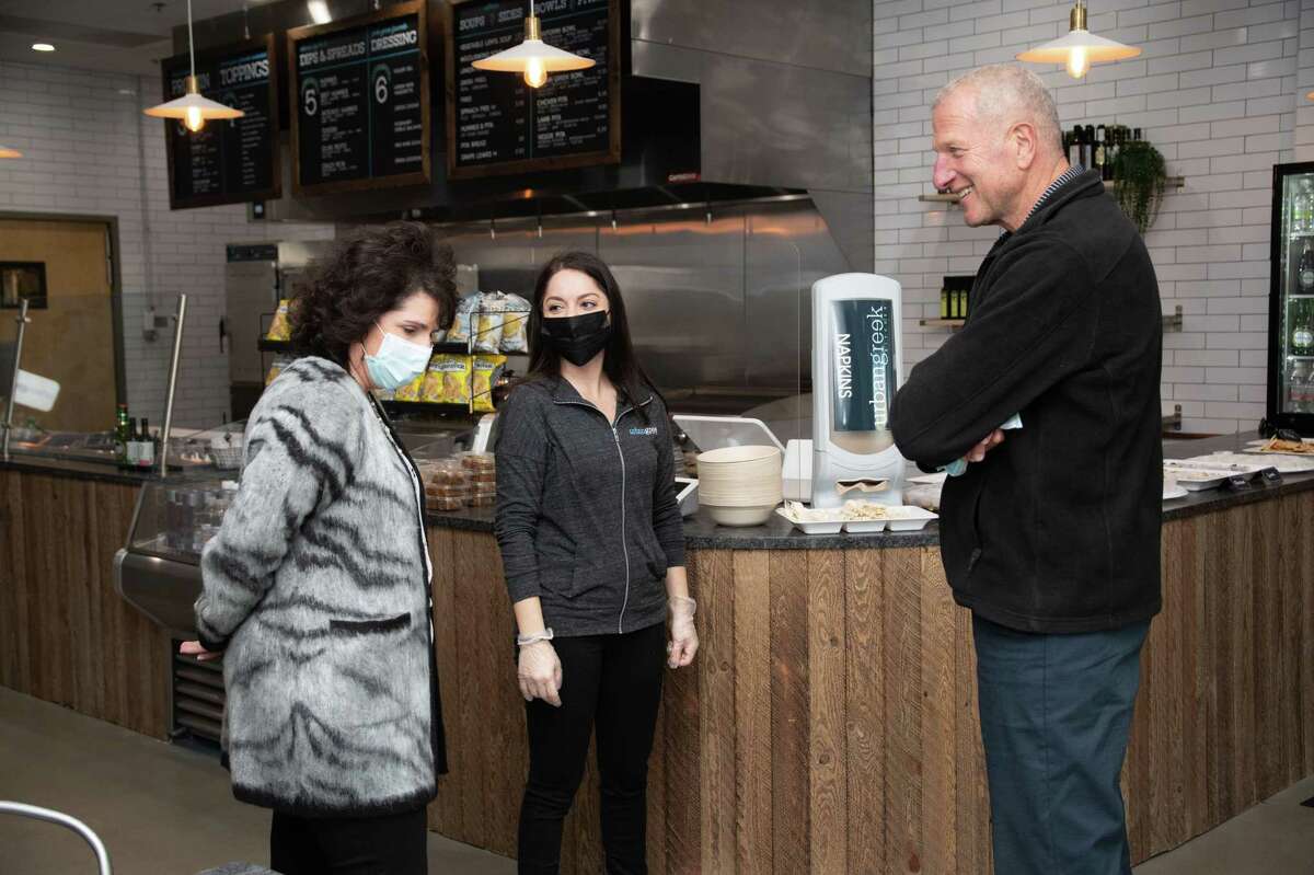 Sophia Diakoloukas, owner of Urban Greek at 702 Bridgeport Ave., speaks with Mayor Mark Lauretti at the grand opening of her eatery Nov. 16. Urban Greek is open for lunch, dinner and catering. Diakoloukas has more than 10 years of experience in corporate after earning her bachelor's degree from Quinnipiac University in 2010 in digital marketing. Since a young age, she said she was exposed to the food industry through her father, who was also a restaurant owner in Connecticut.
