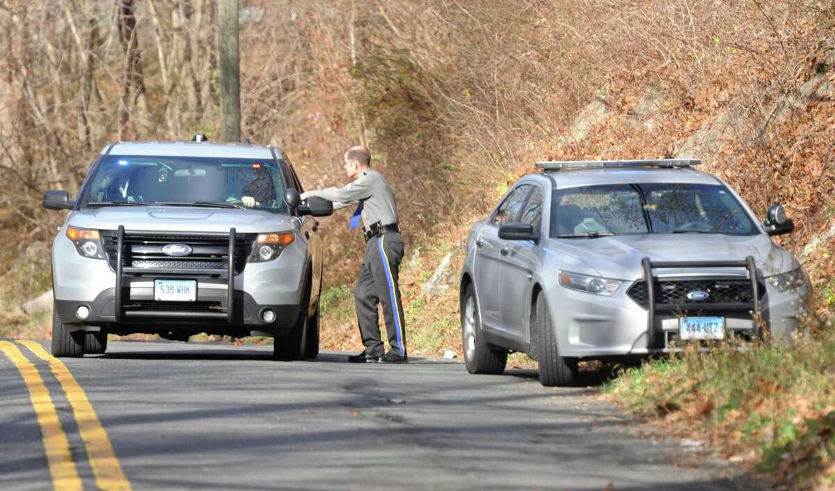 A 65-year-old New Milford man walked away unscathed from a rollover crash on Route 39 in Sherman.