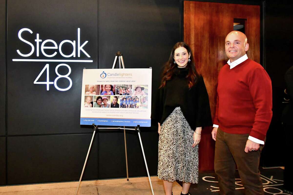 Candlelighters' Director of Development Kelsey Tarpinian and Steak 48 Chief Branding Officer Oliver Badgio at Steak 48's Monday night fundraiser for Candlighters Childhood Cancer Family Alliance for #GivingTuesday