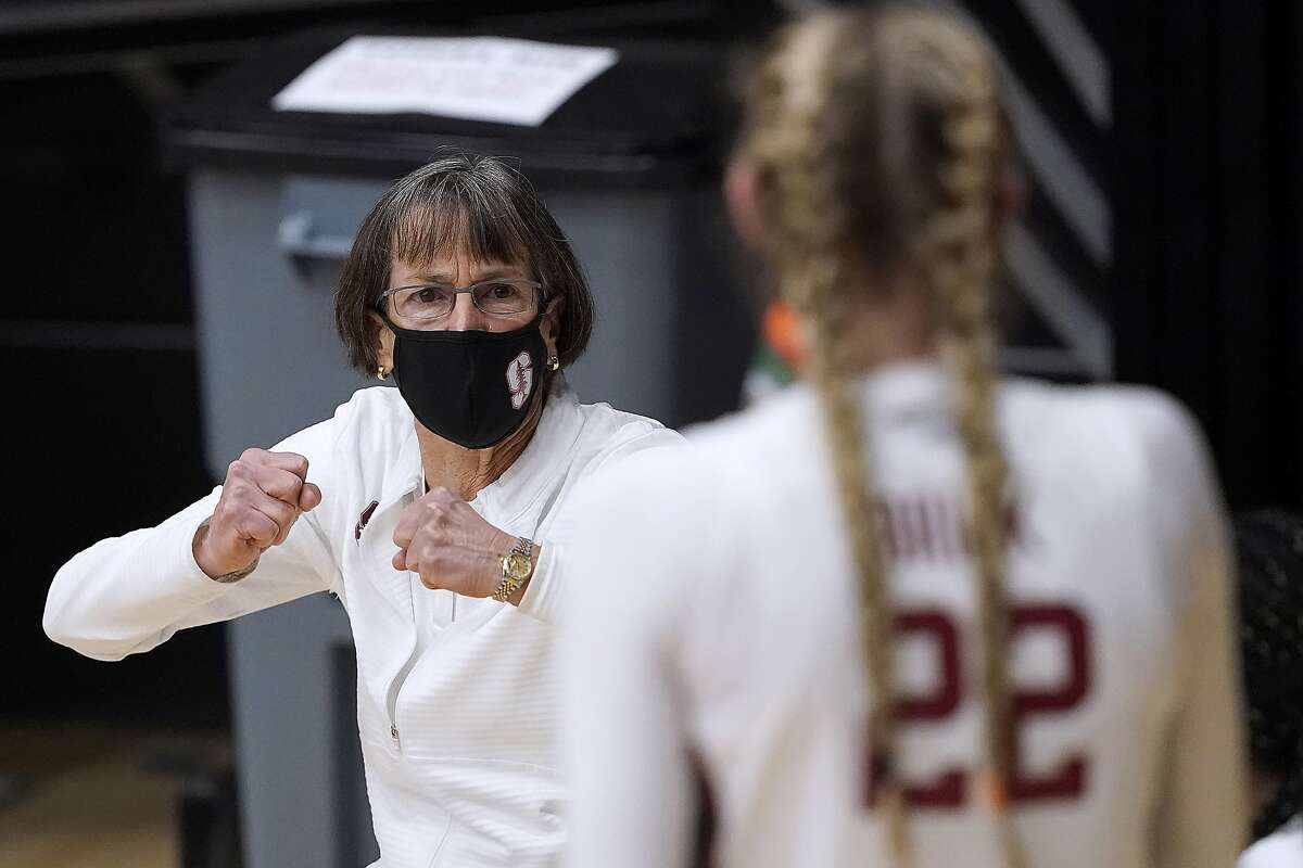 Stanford head coach Tara VanDerveer talks with her players during a timeout against Cal Poly on Nov. 25, 2020. The Cardinal are trying to reshape their schedule in the wake of Santa Clara County restrictions banning sports competition until Dec. 21.