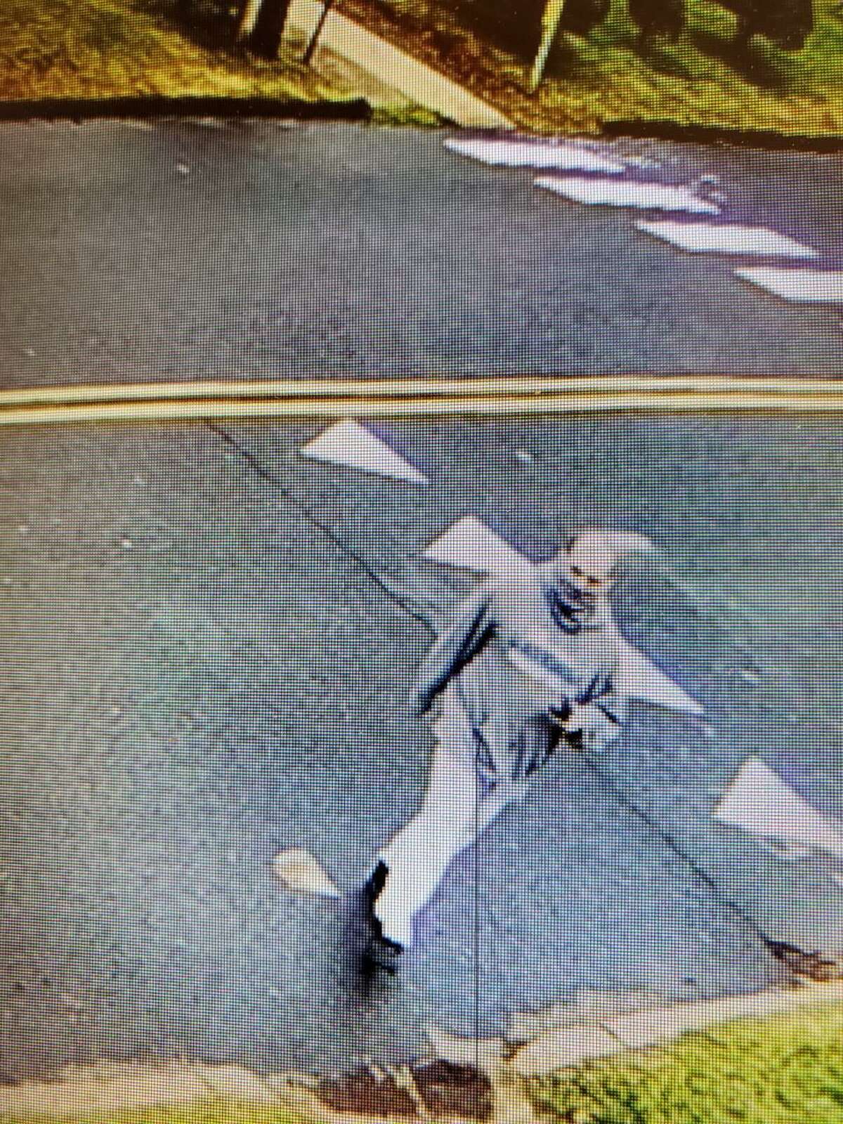 Hamden, Conn. police are asking for the public's help identifying this man they said allegedly smashed a window at the American Job Center on Marne Street on Tuesday, Dec. 1, 2020.