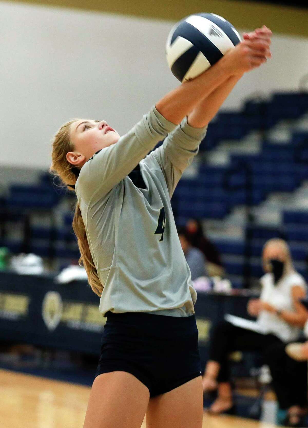 Lake Creek outside hitter Payton Woods (4) returns a hit during the first set of a non-district high school volleyball match at Lake Creek High School, Tuesday, Sept. 15, 2020, in Montgomery.