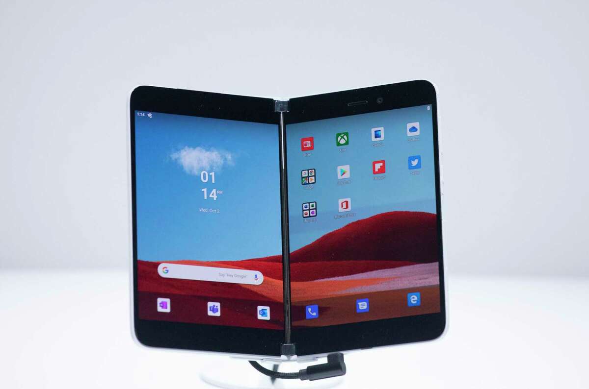 A Microsoft Surface Duo is displayed in New York during a previous fall season. Here is information about upcoming events that are happening in Ridgefield from social media classes, “A Christmas Carol,” and drawing and art history courses.